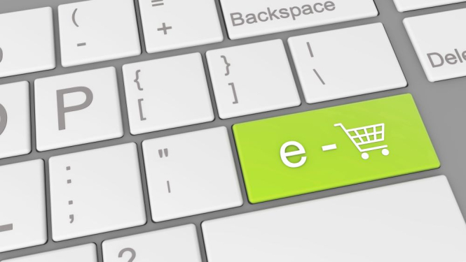 Datora klaviatūra, kur uz Enter taustiņa attēlots iepirkumu simbols